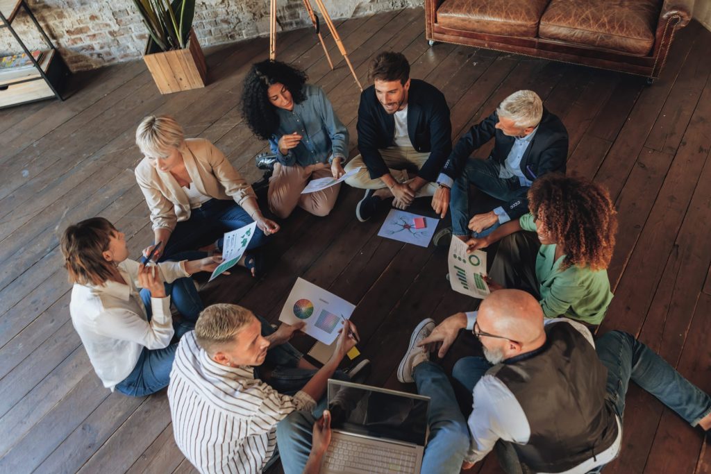 Professionals discussing 2025 SEM trends together