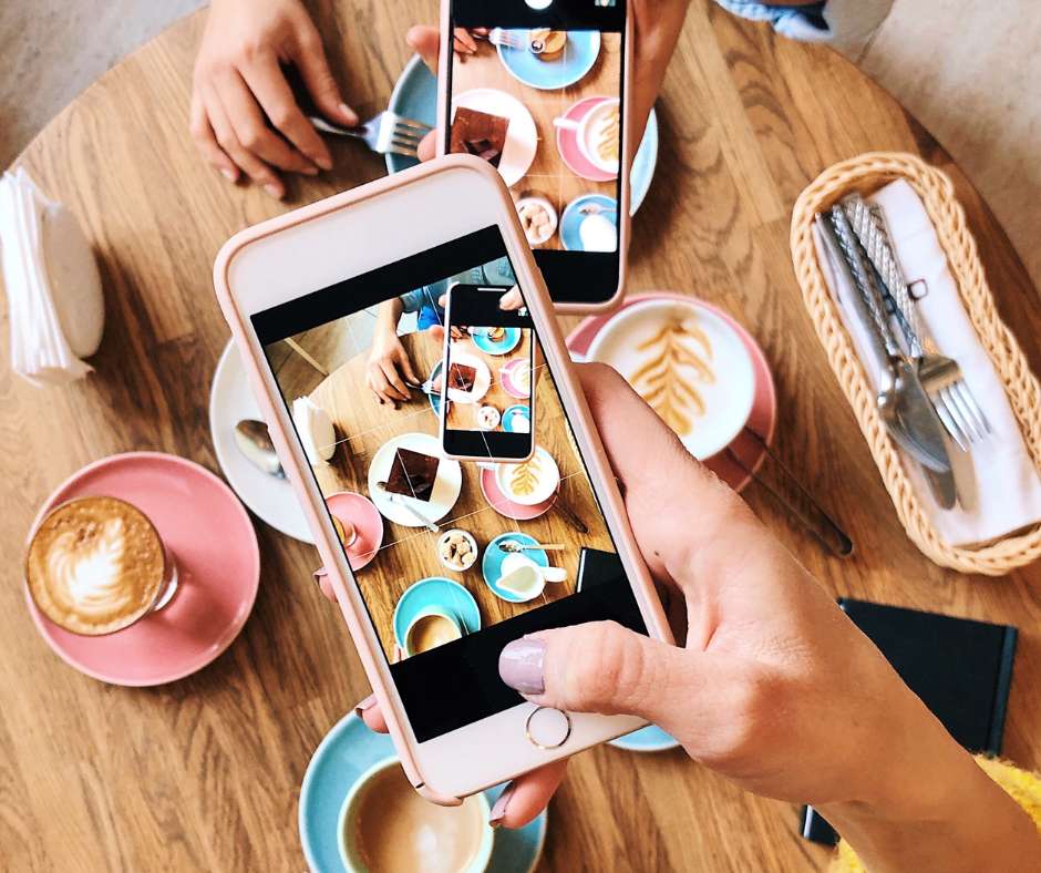 utilizing iphone to take a photo for social media